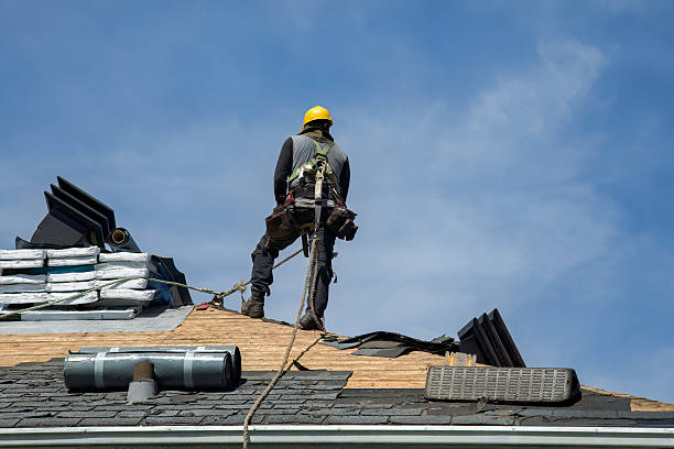 Professional Roofing technician working in Devens, MA